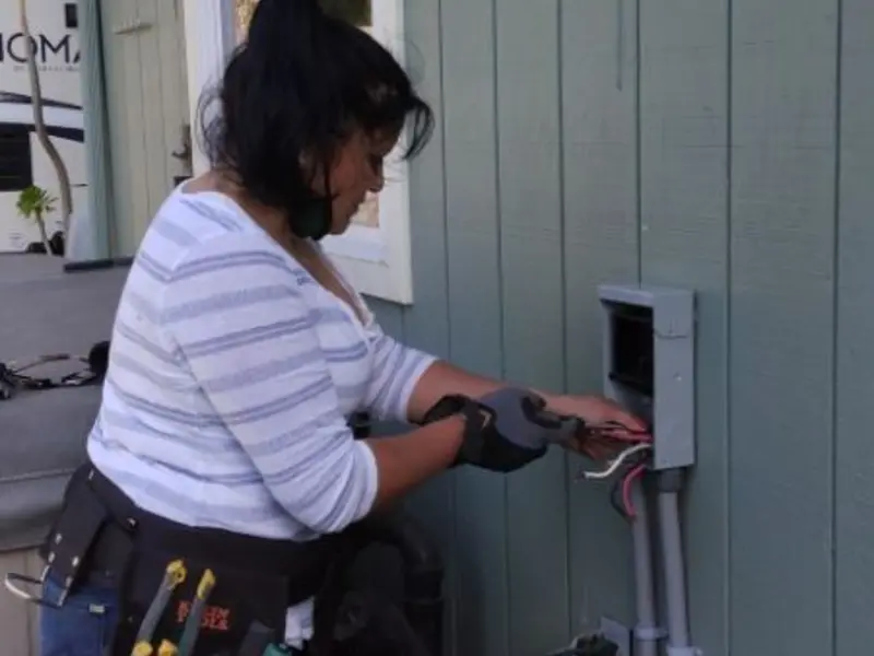 Licensed electrician wiring an exterior subpanel in Wake Village